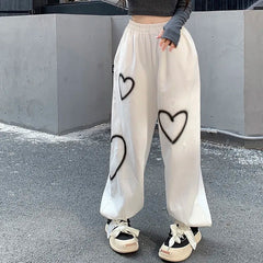 Pantaloni con stampa di cuori Y2k