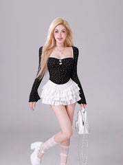 Kiki Good Girl Set di tre pezzi con gonna in velluto a maniche lunghe in cardigan bianco e nero a pois