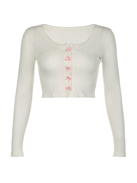 Top cardigan con fiocco angelico